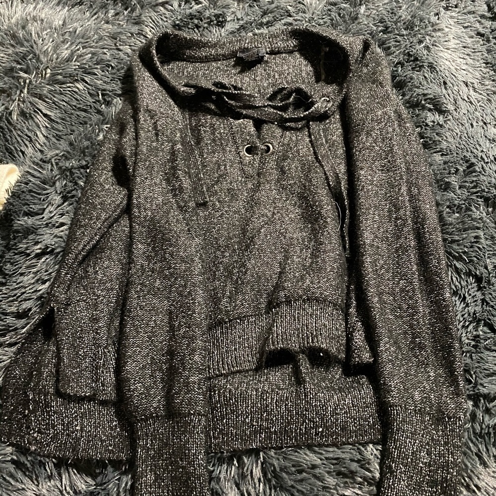 Seven large long sleeve tops